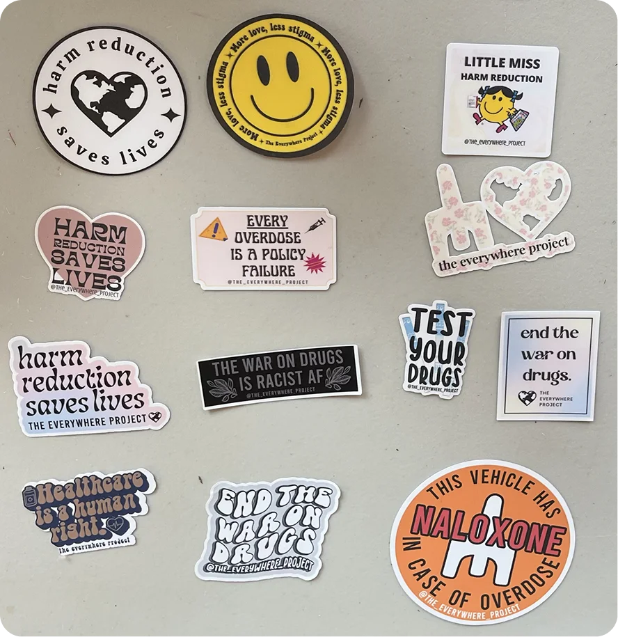 Stickers from The Everywhere Project, a Harm Reduction Org